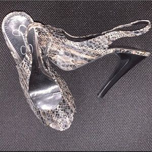 Peek toe snake skinned heels